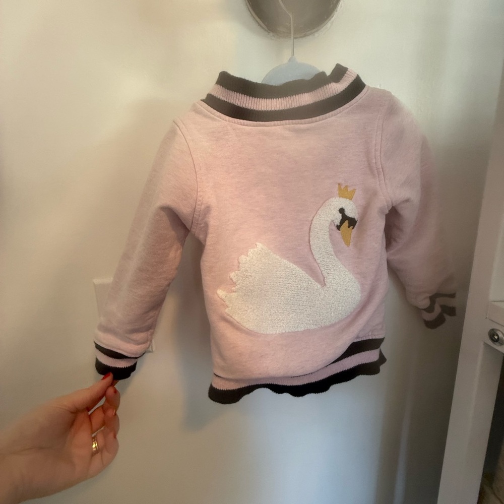 Monica and Andy swan jacket